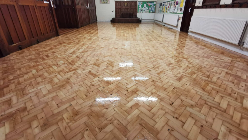 Parquet flooring in a school hall by Mark Antony & Sons Ltd