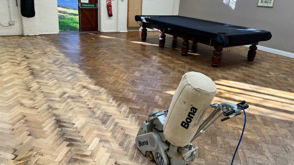 Restaurant wood flooring being sanded by Mark Antony & Sons